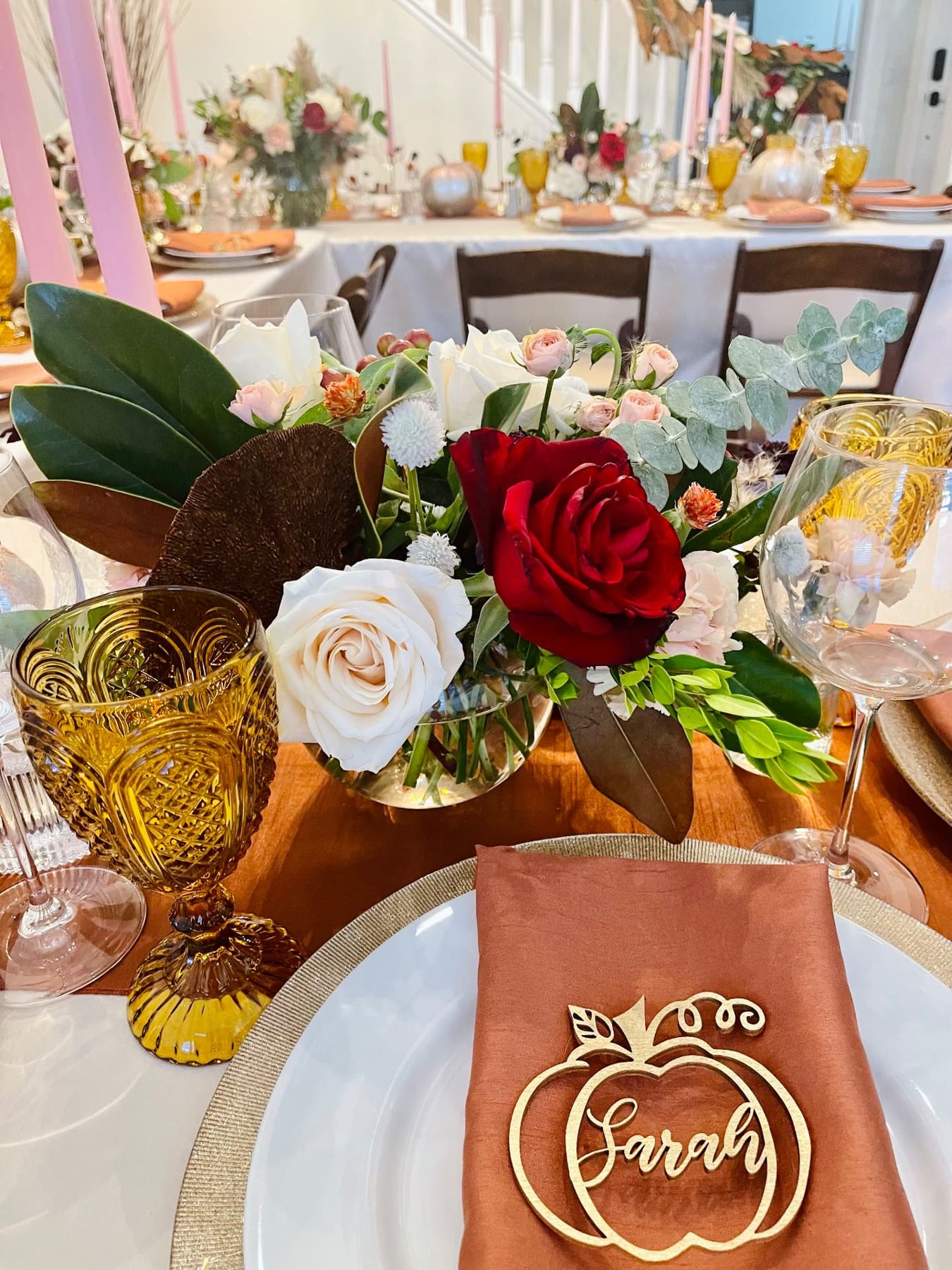 Terracotta and blush centerpiece with amber glass