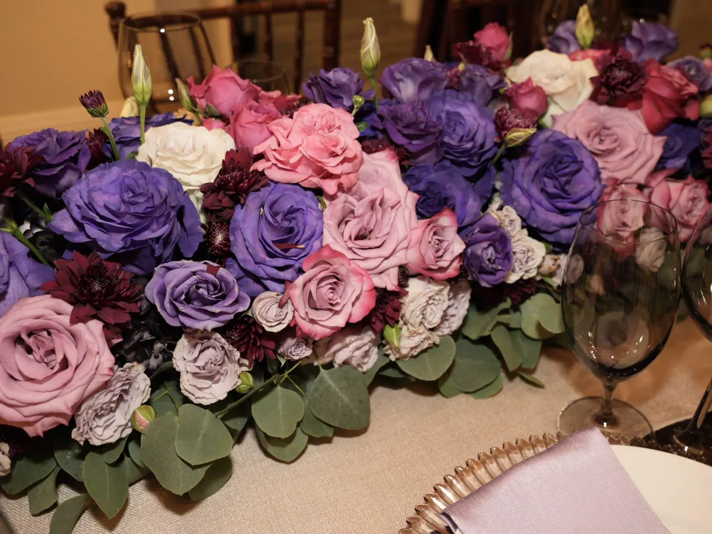 Plum, violet and magenta runner in candlelight