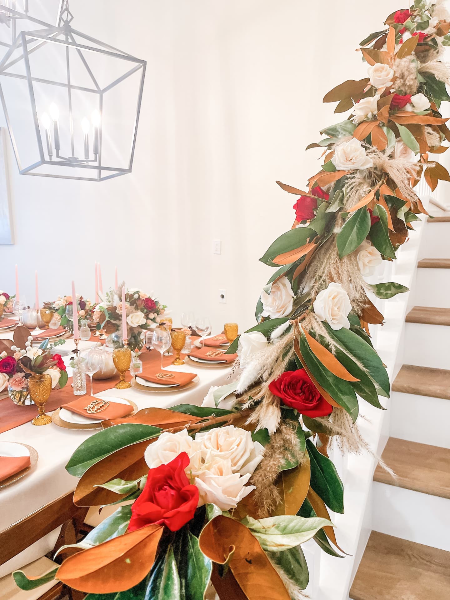 Magnolia leaf and rose staircase garland