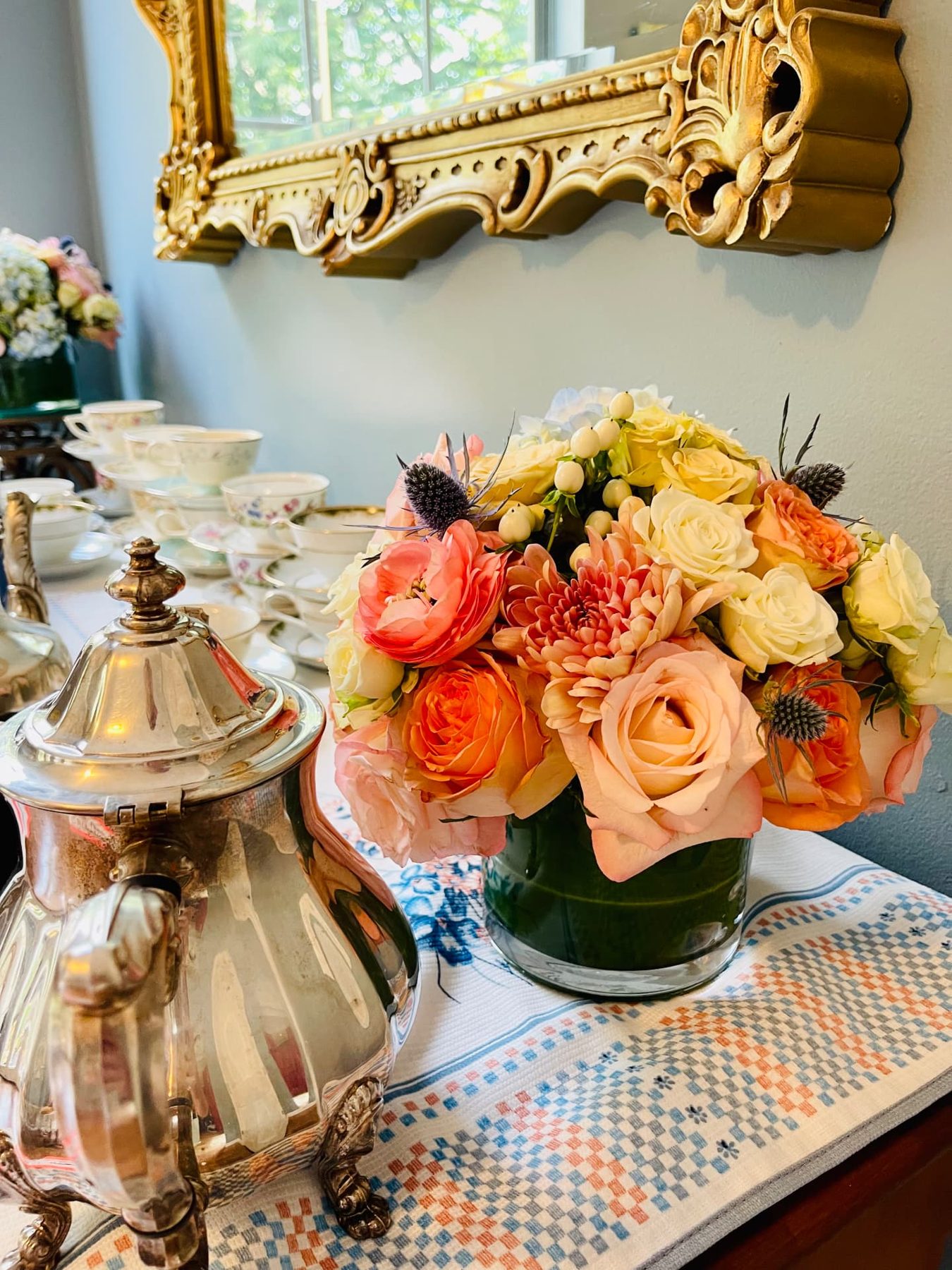 Peach florals with silver tea service