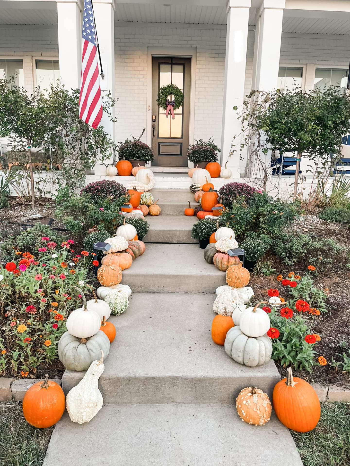 The Grand Welcome fall porch styled by Beautifully in Season