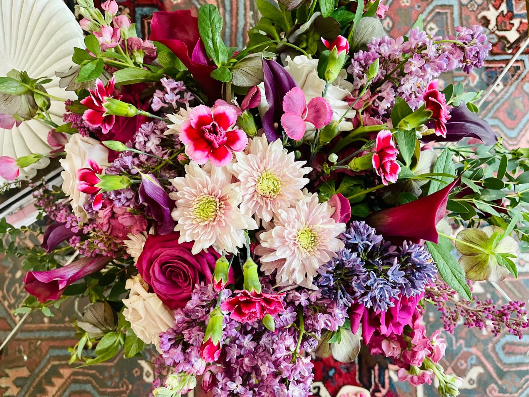 Jewel tone bouquet with calla lilies