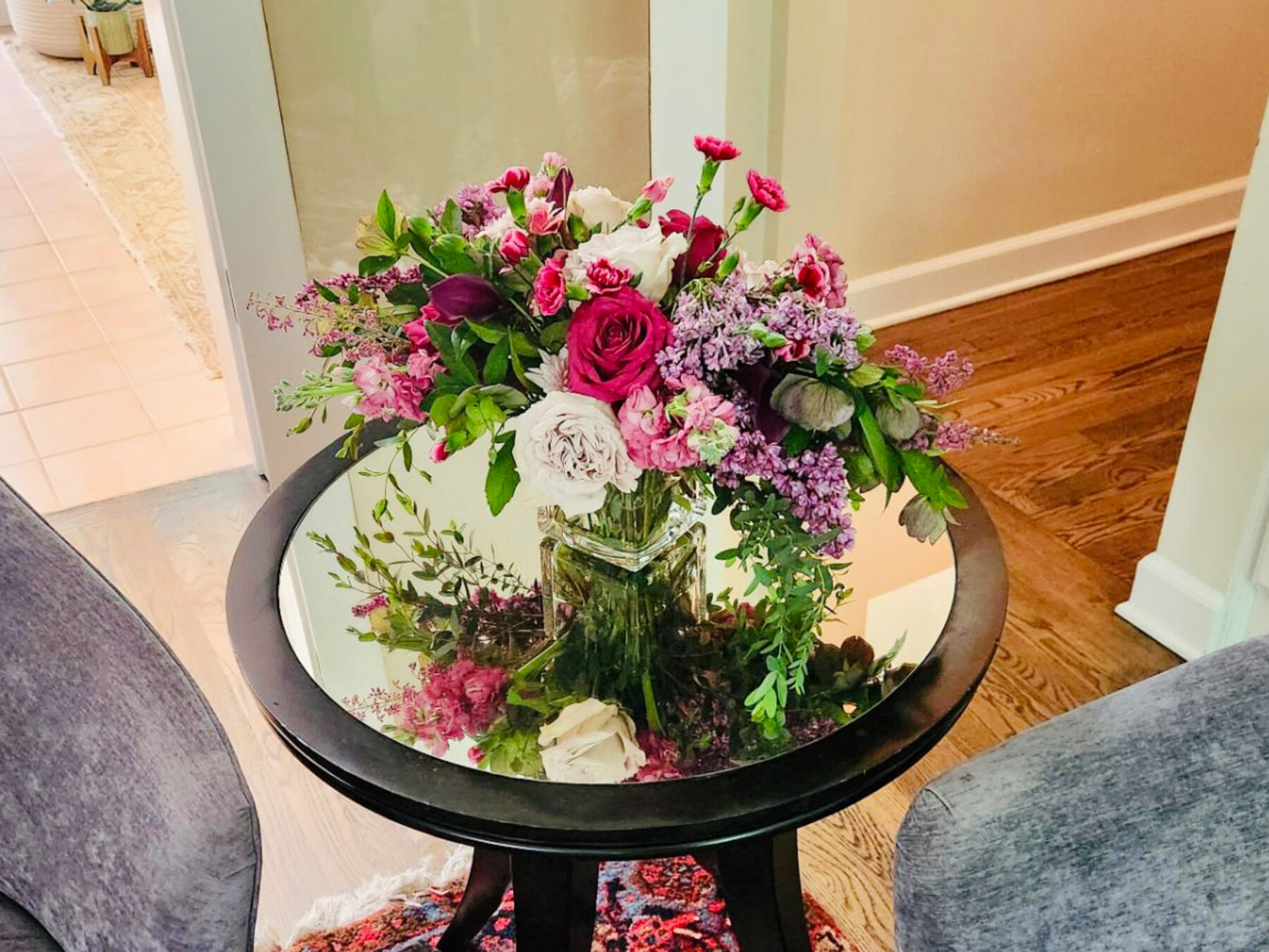 Entry vignette on a mirrored table